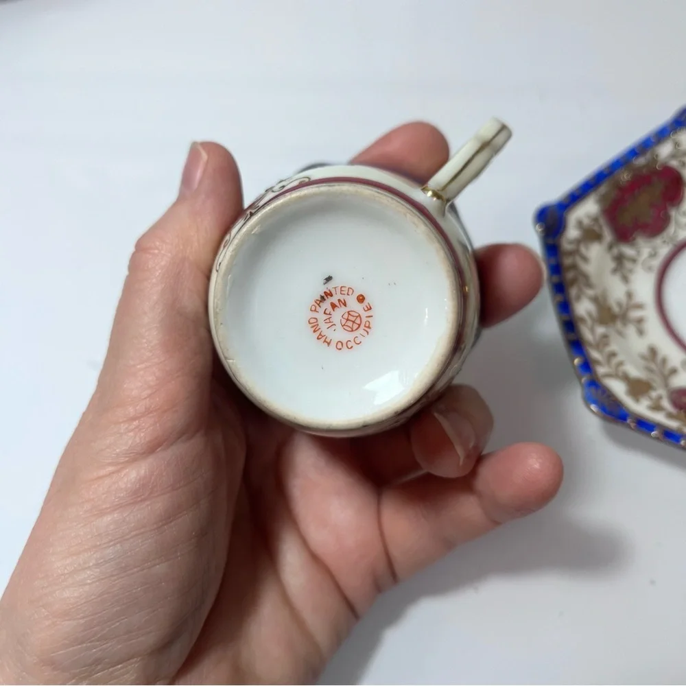 Japanese Ornate Gilt Porcelain Tea Cup & Saucer - Pink, Blue, Gold miniature